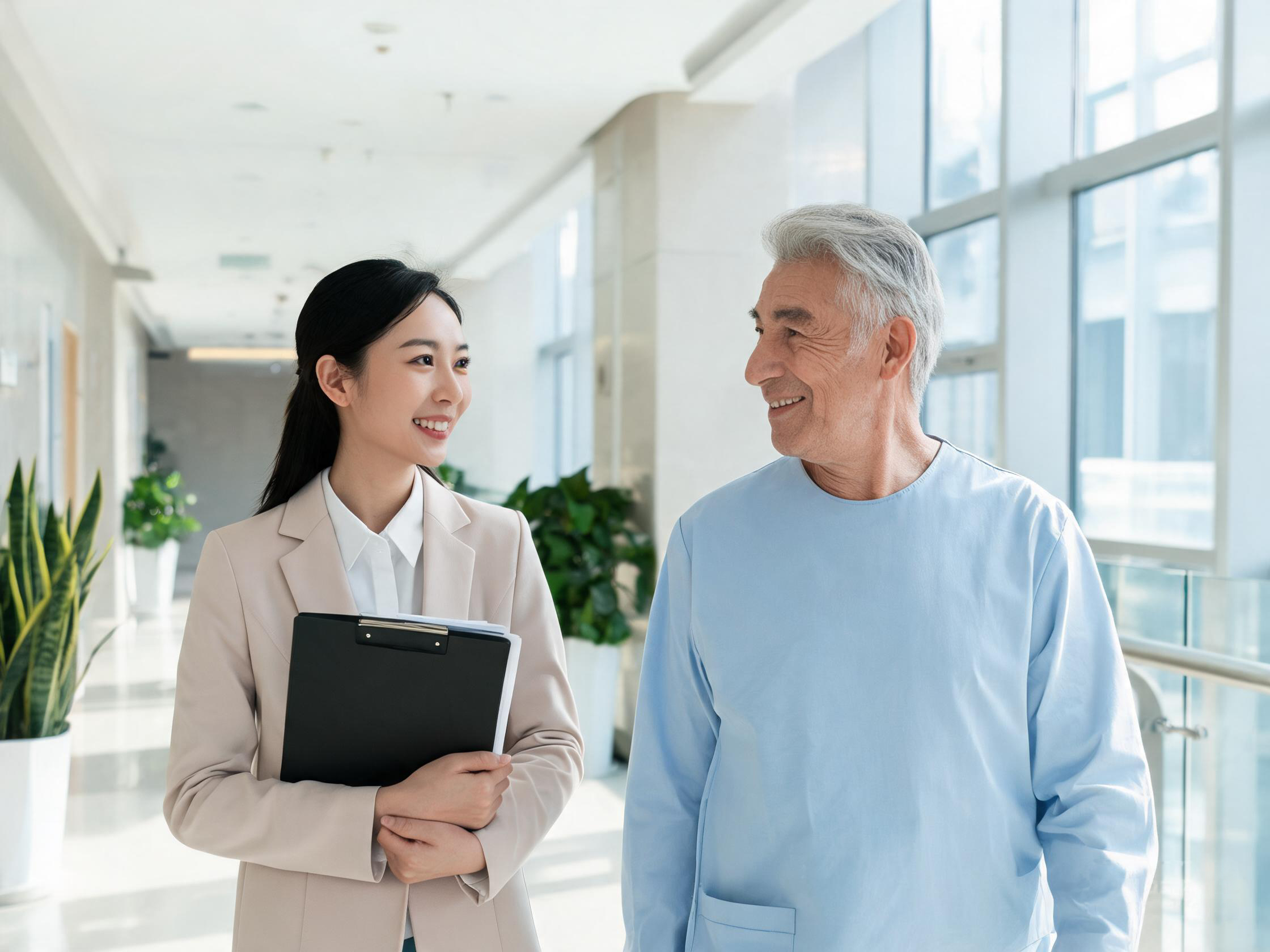 Coordinator accompanying a foreign patient through a hospital corridor